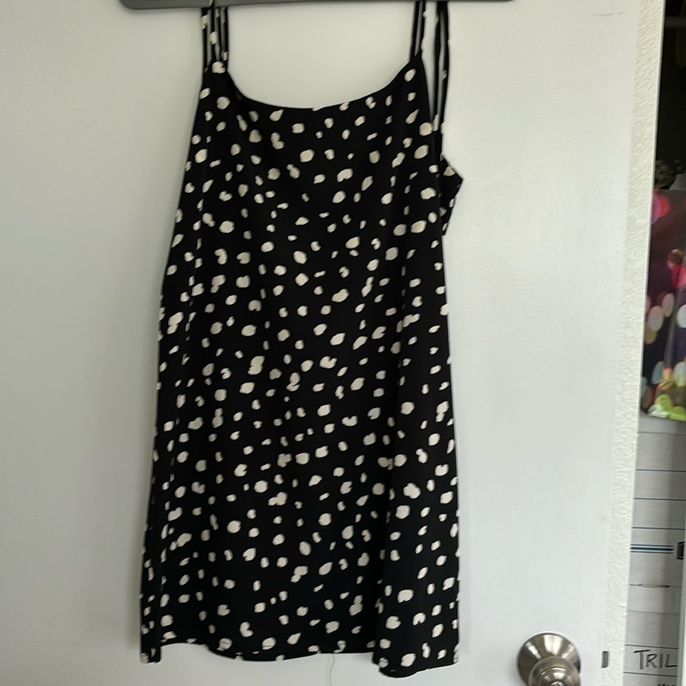 Mahina top, women’s sized large.  Ties; NWOT